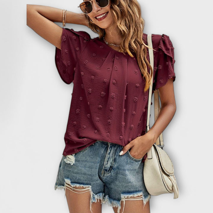 Charlotte – Swiss-Dot'ta mükemmel bluz